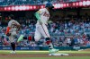 Atlanta Braves' Michael Harris II, right, rounds the bases after hitting a solo home run against the San Francisco Giants during the second inning of a baseball game, Monday, Aug. 31, 2026, in Atlanta. (AP Photo/Erik S. Lesser)