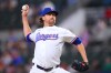 Texas Rangers pitcher Jacob deGrom throws to the Athletics during the first inning of a baseball game Monday, Aug. 31, 2026, in Arlington, Texas. (AP Photo/Julio Cortez)