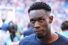 FILE - United States' Folarin Balogun (20) walks off the pitch after losing to Belgium in their World Cup round of 16 soccer match in Seattle, on July 6, 2026. (AP Photo/Ted S. Warren, File)