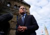 Prime Minister Mark Carney speaks with members of the media as he arrives at the Office of the Prime Minister and Privy Council in Ottawa on Tuesday, Sept. 1, 2026. THE CANADIAN PRESS/Justin Tang