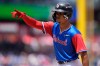FILE - National League's Ethan Salas reacts to hitting a single during the second inning of the MLB All-Star Futures baseball game against the American League on July 12, 2026, in Philadelphia. (AP Photo/Chris Szagola, File)