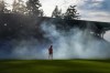 Vancouver Whitecaps goalkeeper Isaac Boehmer calls out to his teammates as smoke from a smoke bomb set off by fans drifts across the field during the first half of a Canadian Championship quarterfinal soccer match against Cavalry FC, in Burnaby, B.C., on Wednesday, July 8, 2026. THE CANADIAN PRESS/Darryl Dyck