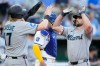 Miami Marlins' Graham Pauley celebrates with Owen Caissie after hitting a two-run home run during the second inning of a baseball game against the Kansas City Royals, Tuesday, Sept. 1, 2026, in Kansas City, Mo. (AP Photo/Charlie Riedel)