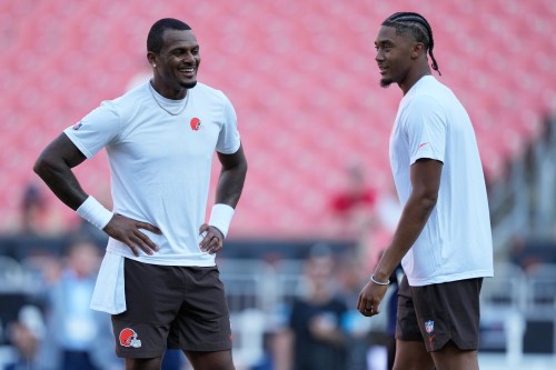 Cleveland Browns quarterback Deshaun Watson, left, talks with quarterback Taylen Green during warmsup before a preseason NFL football game against the New England Patriots Thursday, Aug. 27, 2026, in Cleveland. (AP Photo/Carolyn Kaster)