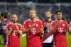 Bayern's Konrad Laimer, left, Bayern's Harry Kane, centre, Bayern's Aleksandar Pavlovic, right, applaud fans after the German soccer cup match between VfL Osnabrueck and Bayern Munich in Osnabrueck, Germany, Wednesday, Sept. 2, 2026. (AP Photo/Martin Meissner)
