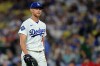 Los Angeles Dodgers pitcher Eric Lauer reacts after giving up back-to-back home runs during the second inning of a baseball game against the St. Louis Cardinals, Tuesday, Sept. 1, 2026, in Los Angeles. (AP Photo/Jayne Kamin-Oncea)