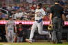 Detroit Tigers' Hao-Yu Lee scores on a RBI double by Riley Greene against the Minnesota Twins during the fifth inning of a baseball game Wednesday, Sept. 2, 2026, in Minneapolis. (AP Photo/Craig Lassig)