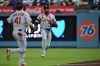 St. Louis Cardinals right fielder Jordan Walker (18) and first baseman Alec Burleson (41) are unable to catch a flyout during the first inning of a baseball game against the Los Angeles Dodgers, Wednesday, Sept. 2, 2026, in Los Angeles. (AP Photo/William Liang)