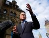 Prime Minister Mark Carney participates in a scrum as he arrives at the Office of the Prime Minister and Privy Council in Ottawa, on Tuesday, Sept. 1, 2026. THE CANADIAN PRESS/Justin Tang