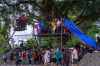 Residents pull the steel wire of a newly installed zip line to help people commute across the Trishuli river in the aftermath of flash floods at Bidur in Nepal's Nuwakot district, Nepal, on Wednesday, Sept. 2, 2026. (AP Photo/Rajesh Kumar Singh)
