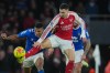 FILE - Sunderland's Reinildo Mandava, left, and Arsenal's Gabriel Martinelli fight for the ball during the English Premier League soccer match between Arsenal and Sunderland in London, England, Feb. 7, 2026. (AP Photo/Kin Cheung, File)