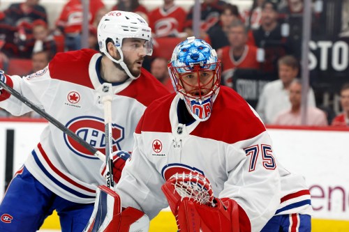 Montreal Canadiens goaltender Jakub Dobes (75) looks for the puck during the second period in Game 5 of the Eastern Conference finals NHL hockey Stanley Cup playoff series against the Carolina Hurricanes in Raleigh, N.C., Friday, May 29, 2026. (AP Photo/Karl DeBlaker)