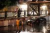 People prepare to tow a car out from a flooded underpass during a storm in Toronto on Wednesday, Sept. 2, 2026. THE CANADIAN PRESS/Keito Newman