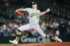 Athletics relief pitcher Hogan Harris throws against the Seattle Mariners during the ninth inning of a baseball game, Thursday, Sept. 3, 2026, in Seattle. (AP Photo/Lindsey Wasson)
