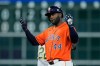 Houston Astros' Yordan Alvarez celebrates after hitting an RBI double during the seventh inning of a baseball game against the Athletics, Friday, Aug. 21, 2026, in Houston. (AP Photo/Kevin M. Cox)