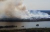 A wildfire burns in northern Manitoba near Flin Flon on Tuesday, May 14, 2024. THE CANADIAN PRESS/David Lipnowski