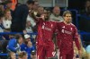 Liverpool's Alexander Isak celebrates with Liverpool's Milos Kerkez, right, after scoring during the English Premier League soccer match between Ipswich Town and Liverpool in Ipswich, England, Friday, Sept. 4, 2026. (AP Photo/Dave Shopland)