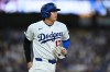 Los Angeles Dodgers' Shohei Ohtani runs after being walked during the first inning of a baseball game against the St. Louis Cardinals, Wednesday, Sept. 2, 2026, in Los Angeles. (AP Photo/William Liang)