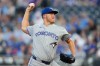 Toronto Blue Jays starting pitcher Jameson Taillon throws during the first inning of a baseball game against the Kansas City Royals, Friday, Sept. 4, 2026, in Kansas City, Mo. (AP Photo/Charlie Riedel)
