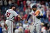 Atlanta Braves' Austin Riley, left, and Ronald Acuña Jr. celebrate after the Braves won a baseball game against the Philadelphia Phillies Friday, Sept. 4, 2026, in Philadelphia. (AP Photo/Matt Slocum)