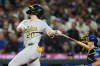 Athletics' Zack Gelof follows through on an RBI triple against the Seattle Mariners during the fifth inning of a baseball game, Friday, Sept. 4, 2026, in Seattle. (AP Photo/Lindsey Wasson)