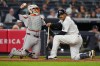 New York Yankees' Trent Grisham reacts after an inside pitch during the sixth inning of a baseball game against the Houston Astros Tuesday, Aug. 25, 2026, in New York. (AP Photo/Frank Franklin II)