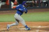 Chicago Cubs' Michael Busch hits a double during the fifth inning of a baseball game against the Miami Marlins Saturday, Sept. 5, 2026, in Miami. (AP Photo/Marta Lavandier)