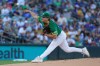 Athletics pitcher J.T. Ginn (35) throws during the first inning of a baseball game against the Minnesota Twins Wednesday, Aug. 26, 2026, in West Sacramento, Calif. (AP Photo/Alan Greth)