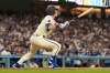 Los Angeles Dodgers' Tommy Edman heads to first for a three-run home run during the seventh inning of a baseball game against the Washington Nationals, Saturday, Sept. 5, 2026, in Los Angeles. (AP Photo/Mark J. Terrill)