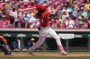 Cincinnati Reds' Elly De La Cruz follows through after hitting a two-run home run in the fourth inning of a baseball game against the Milwaukee Brewers, Sunday, Sept. 6, 2026, in Cincinnati. (AP Photo/Kareem Elgazzar)
