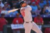 St. Louis Cardinals' Iván Herrera watches his double which drove in two runs off Colorado Rockies relief pitcher Nick Frasso in the eighth inning of a baseball game Sunday, Sept. 6, 2026, in Denver. (AP Photo/David Zalubowski)