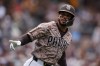 San Diego Padres' Luis Campusano celebrates after hitting a home run during the seventh inning of a baseball game against the New York Yankees Sunday, Sept. 6, 2026, in San Diego. (AP Photo/Gregory Bull)