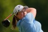 Lottie Woad hits off the 14th tee during the first round of the LPGA FM Championship golf tournament in Norton, Mass., Thursday, Aug. 27, 2026. (AP Photo/Charles Krupa)