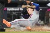 New York Mets' Carson Benge scores on a double hit by Marcus Semien during the sixth inning of a baseball game against the Miami Marlins, Monday, Sept. 7, 2026, in Miami. (AP Photo/Lynne Sladky)