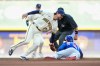 Chicago Cubs' Pete Crow-Armstrong, right, steals second base as Milwaukee Brewers second baseman Brice Turang (2) is late to the tag during the fifth inning of a baseball game Monday, Sept. 7, 2026, in Milwaukee. (AP Photo/Kayla Wolf)