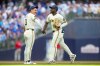 Milwaukee Brewers right fielder Luis Lara, right, celebrates with third baseman Joey Ortiz (3) after their team won a baseball game against the Chicago Cubs, Monday, Sept. 7, 2026, in Milwaukee. (AP Photo/Kayla Wolf)