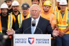 Ontario Premier Doug Ford speaks to media at a housing development in Hamilton, on Monday, Aug. 24, 2026. THE CANADIAN PRESS/Nick Iwanyshyn