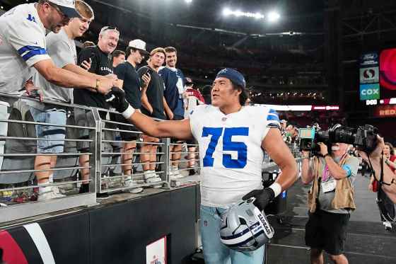 Dallas Cowboys offensive tackle Shiyazh Pete greets fans after a preseason NFL football game against the Arizona Cardinals Saturday in Glendale, Ariz. (Rick Scuteri / The Associated Press files)