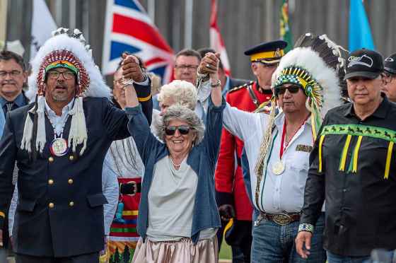 The Gov.-Gen. Louise Arbour (centre) takes part in the Grand Entry with Chief Edwin Ananas of Beardy’s and Okemasis Cree Nation (left) and former Frog Lake First Nation Chief George Stanley at the 150th Commemoration marking the signing of Treaty 6 at Fort Carlton Provincial Historical Park, in Duck Lake, Sask., on Sunday. (Matt Smith / Canadian Press files)