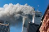 Smoke rises from the burning twin towers of the World Trade Center after hijacked planes crashed into the towers, Sept. 11, 2001, in New York.  THE CANADIAN PRESS/AP-Richard Drew