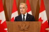 Prime Minister Mark Carney speaks about Canada's response to new U.S. tariffs during a news conference on Parliament Hill in Ottawa on Saturday, Aug. 22, 2026. THE CANADIAN PRESS/Patrick Doyle