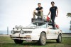 Adam Riddell, left, and Jaden Konishi are pictured with Adam's Isuzu Impulse RS in Vancouver, on Sunday, Sept. 13, 2026. THE CANADIAN PRESS/Ethan Cairns