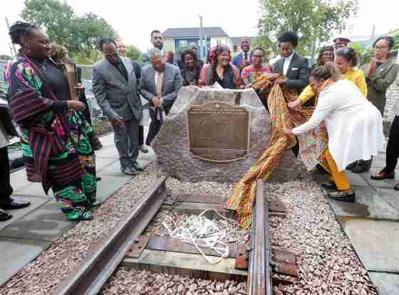 Government officials, descendants and family and community members gather to celebrate as the Order of Sleeping Car Porters Memorial Garden is unveiled at 799 Main St. in Winnipeg on Friday. The garden honours a legacy that began when Black railway workers organized North America’s first Black union in the city in 1917. The memorial serves as a lasting tribute to the porters, their families and labour leaders whose advocacy advanced labour rights, racial equality and human dignity across Canada. (Ruth Bonneville / Free Press)