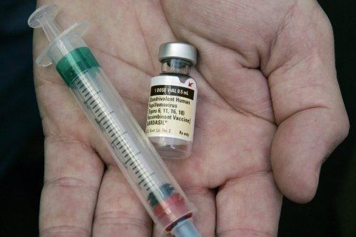 A resurfaced video shows Robert F. Kennedy Jr., now U.S. health secretary, claiming children who receive the HPV vaccine Gardasil are more likely to die from the vaccine than from cervical cancer. In this Aug. 28, 2006 file photo, a doctor holds a vial of the human papillomavirus (HPV) vaccine Gardasil in his Chicago office. (AP Photo/Charles Rex Arbogast, File)