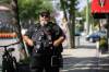 MIKAELA MACKENZIE / FREE PRESS
                                Michael Paille, executive director of the Sargent Business Community, patrols Sargent Avenue last month.