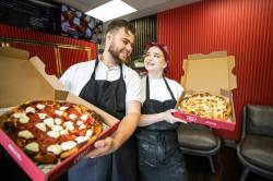 Photos by MIKAELA MACKENZIE / FREE PRESS
                                The crust is so vital to their pizza that owners Oleksii Samokhval and Iryna Mehedyn make it a point of pride in their company&rsquo;s name.