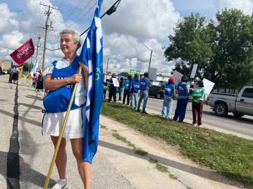 CAROL SANDERS / FREE PRESS
                                Bozena Turczynowicz retired last month after working for Dynacare for 26 years, and showed up at an information picket outside the Dynacare laboratory on King Edward Street Wednesday. &ldquo;I&rsquo;m here to support all my colleagues because they&rsquo;re fighting for a just cause.&rdquo;