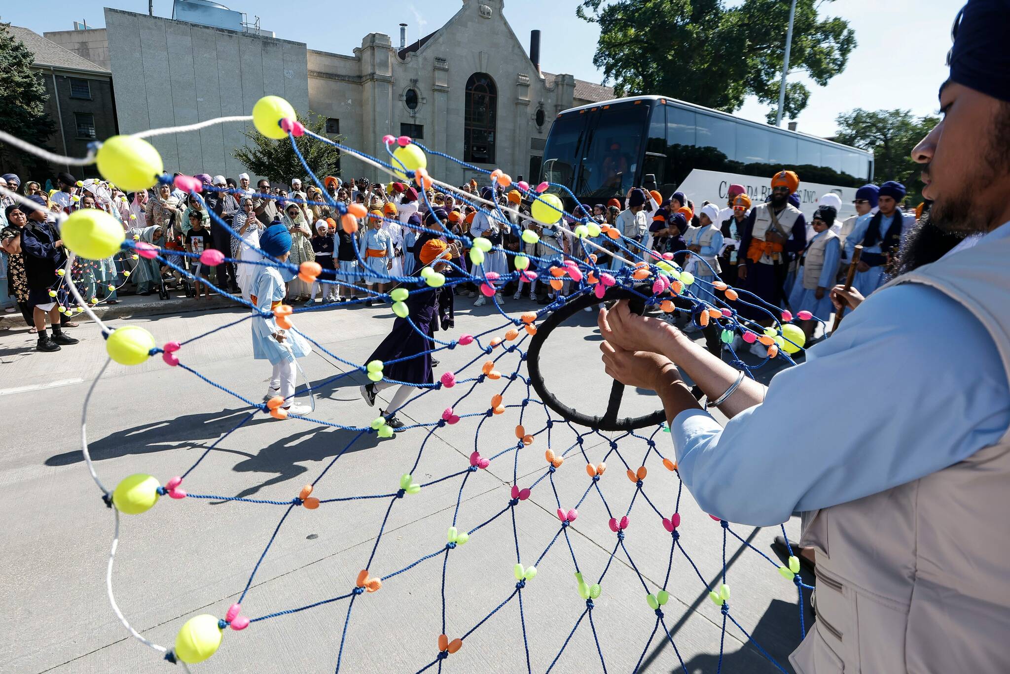 ‘We belong… and we are giving back”: Sikh celebration enlivens downtown ...