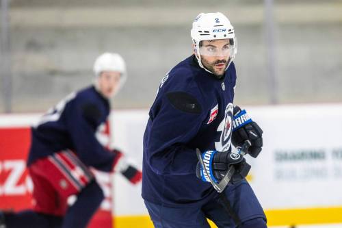 MIKAELA MACKENZIE / FREE PRESS
                                While Winnipeg Jets defenceman Dylan DeMelo was honoured to play for Team Canada at this year&rsquo;s men&rsquo;s hockey worlds, he&rsquo;s hoping a Stanley Cup run will prevent his participation in next year&rsquo;s tourney.