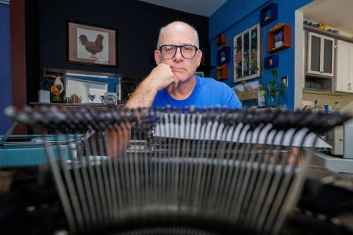 MIKE DEAL / FREE PRESS
                                Michael J. Clark is a local suspense/crime author who writes his books using manual typewriters. He began collecting the machines in 2015.